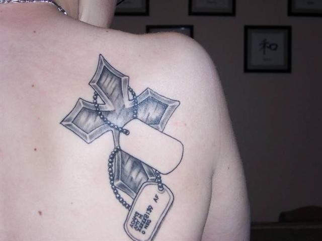 Cross+with+dog+tags+tattoo